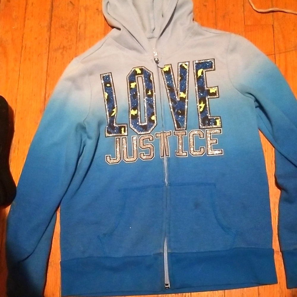 A blue 'love justice " jacket